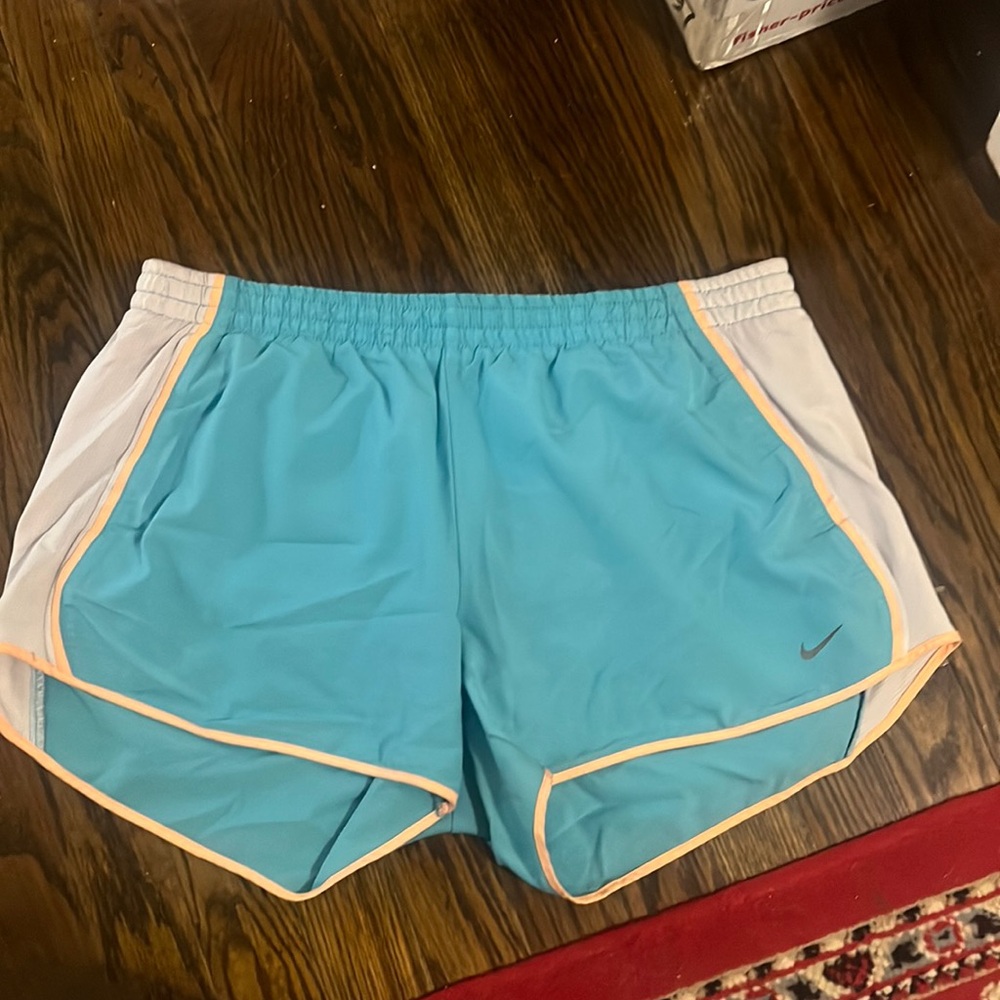 Nike running shorts in blue and orange. Size large